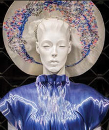A mannequin wears a blue dress, which is color-enhanced by Philips LED flavors